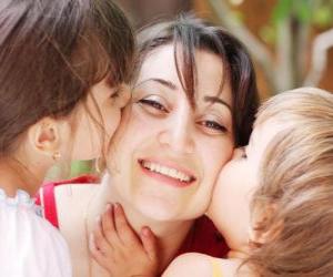 Mom or mother to receive kisses from their children puzzle