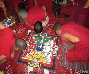 Monks making a mandala puzzle