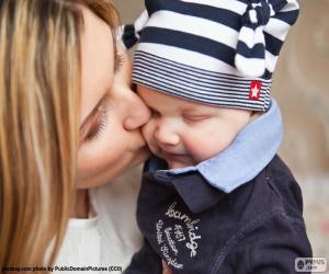 Mother kissing her baby puzzle