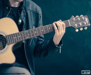 Musician playing the guitar puzzle