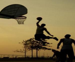 One on one basketball between two young friends puzzle