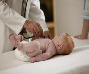 Pediatrician exploring a baby puzzle