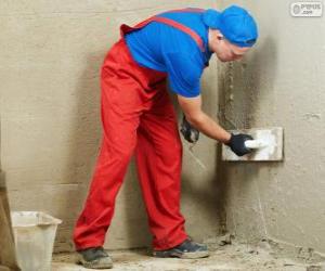 Plasterer working on a wall cladding puzzle