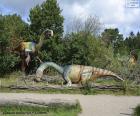 Group of three dinosaurs in the landscape