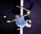 Rafa Nadal preparing to hit a serve
