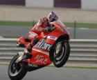 Casey Stoner raising wheel