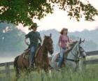 Miley Stewart / Hannah Montana (Miley Cyrus) horse riding with his friend Travis Brody (Lucas Till) 