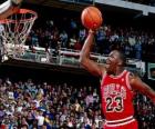 Michael jordan going for a slam dunk