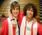 Troy Bolton (Zac Efron) and Chad (Corbin Bleu) the day of graduation