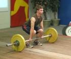 Weightlifting - Weightlifter in the beginning of the exercise