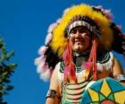 Indian chief's face with war paints and the feathers on the head