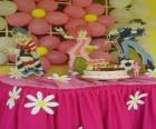 Celebration of birthday cake with candles, gifts and balloons