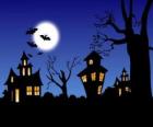 Haunted house at Halloween - Full moon, bats