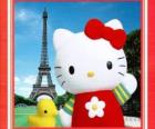 Hello Kitty with a birdie and the Eiffel Tower in background