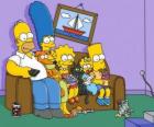 The Simpson family on the couch at home