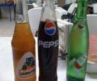 Three bottles of drinks, soft drink or soda