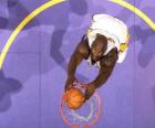 Shaquille O neal going for a slam dunk