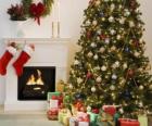 Fireplace in Christmas with the hung socks and with Christmas decorations