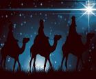 The Three Kings on their camels on the way guided by the Star of Bethlehem