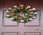 Wreath of Christmas hung in the doorway of a house