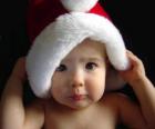 Boy with a Santa Claus hat