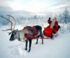 Santa Claus in its magical flying sleigh pulled by a Christmas reindeer