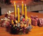 Center table with four lighted candles