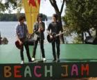 Brothers Shane (Joe Jonas), Nate (Nick Jonas) and Jason Gray (Kevin Jonas) singing at the Camp Rock Beach Jam