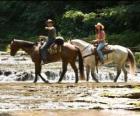 Miley Stewart / Hannah Montana (Miley Cyrus) horse riding with his friend Travis Brody (Lucas Till) 