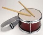 A drum, with a pair of drumsticks