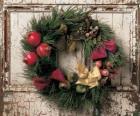 Wreath of Christmas hung in the doorway of a house