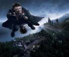 Harry Potter flying with his magic broom
