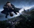 Harry Potter flying with his magic broom