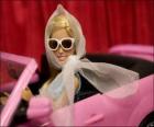 Barbie driving his car