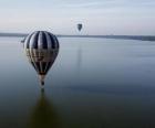 Balloon flying over water