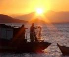 Fishermen at sunset