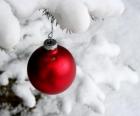 Christmas bauble hanging from tree