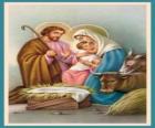 The Holy Family - Joseph, Mary and infant Jesus in the manger with the ox and the mule