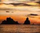 Sunset over the sea with the Medes Islands in the background