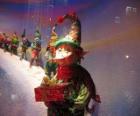 Santa's elfs carrying a box of a present