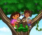 Dora and cousin Diego into a tree two little bears helping