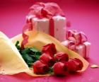 Red roses and a gift for Valentine's