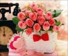 Basket of pink roses and hearts