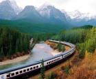 Train passengers in a mountainous Landscape