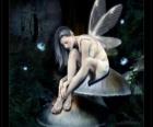 Fairy sitting on a mushroom