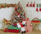 Highly decorated Christmas tree and gifts