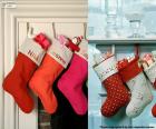 Several hanging Christmas stockings full of gifts