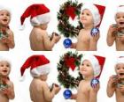 Children with Santa Claus hats and playing with Christmas decorations