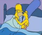 Homer and Marge giving himself a good night kiss