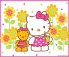 Hello Kitty with a drink in the countryside with her teddy bear Tiny Chum